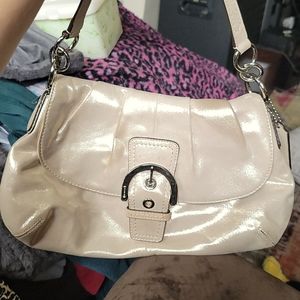 Have too many purses lol This is a Coach Soho Leather Bag